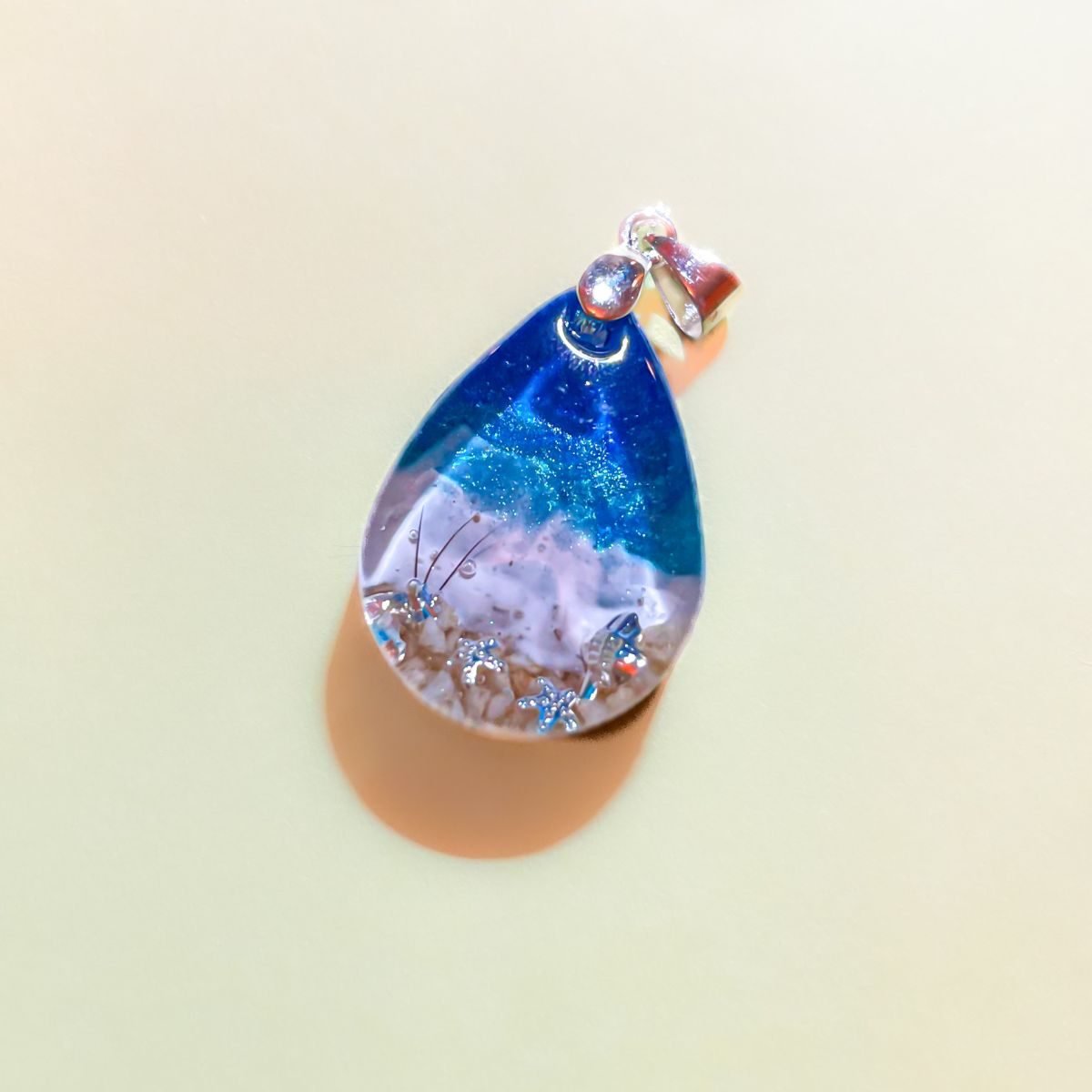 Colgante personalizado pestañas y mar